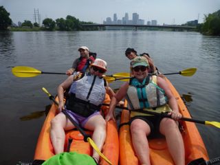 Kayaking the Mississippi in Minneapolis surrounded by nature, but never leaving its skyline