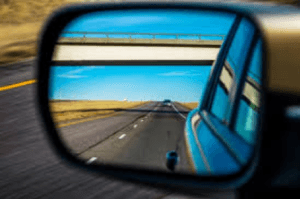 Side_Mirror_of_Car_with_Road_Reflection